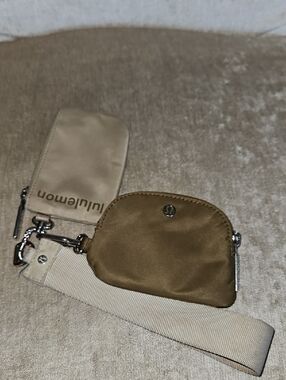 lululemon Dual Pouch mini zip pouch with silver logo wristlet
